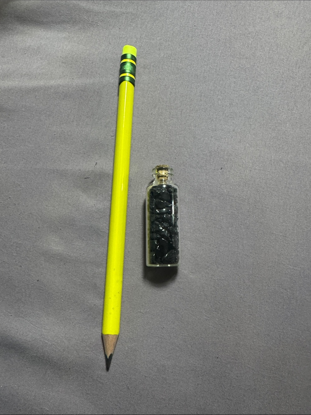 Small jar with mixed black crystal chips